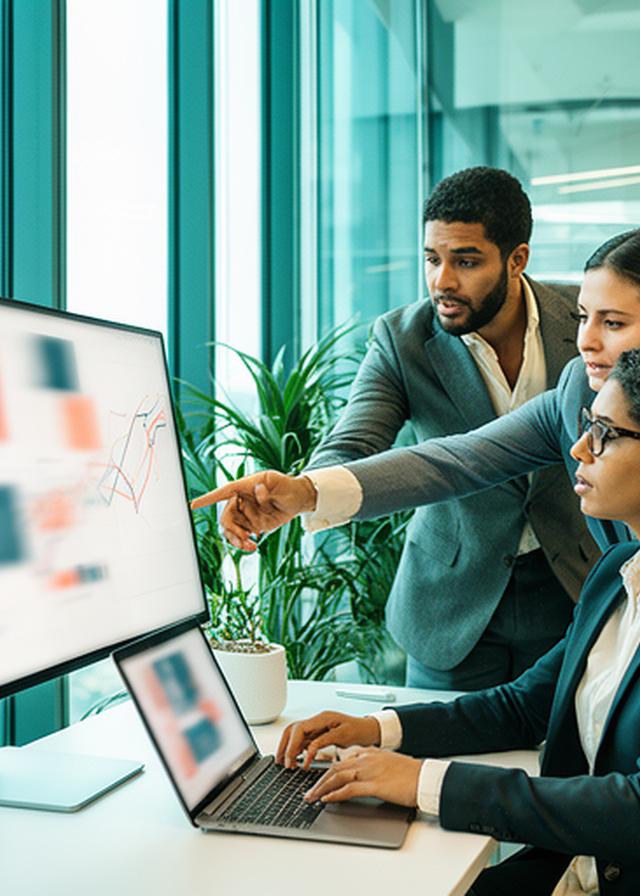 Business team studying a market entry chart beside a window